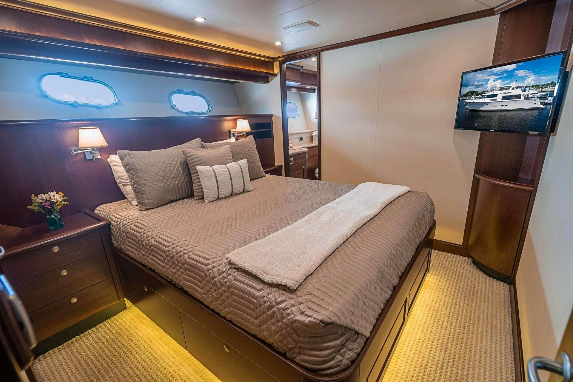 a bed in a room aboard BOOGIE BABE IV Yacht for Sale
