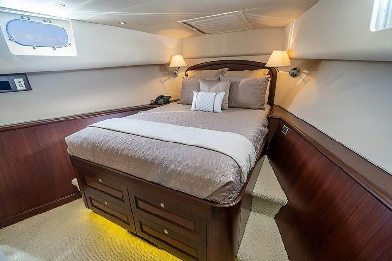 a bed in a room aboard BOOGIE BABE IV Yacht for Sale