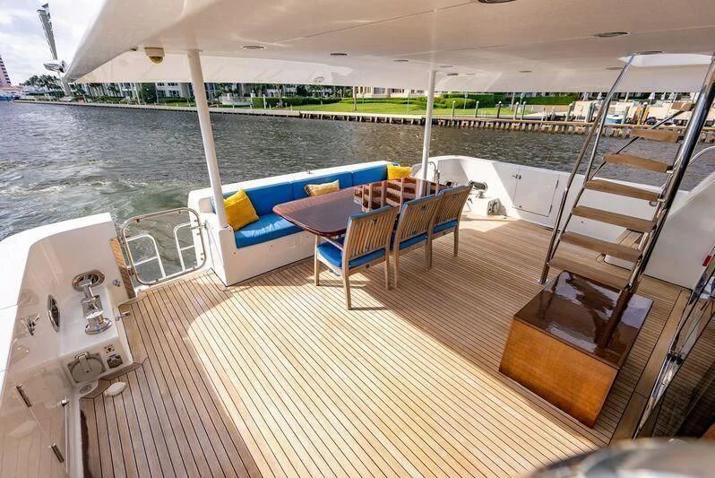 a boat on the water aboard BOOGIE BABE IV Yacht for Sale
