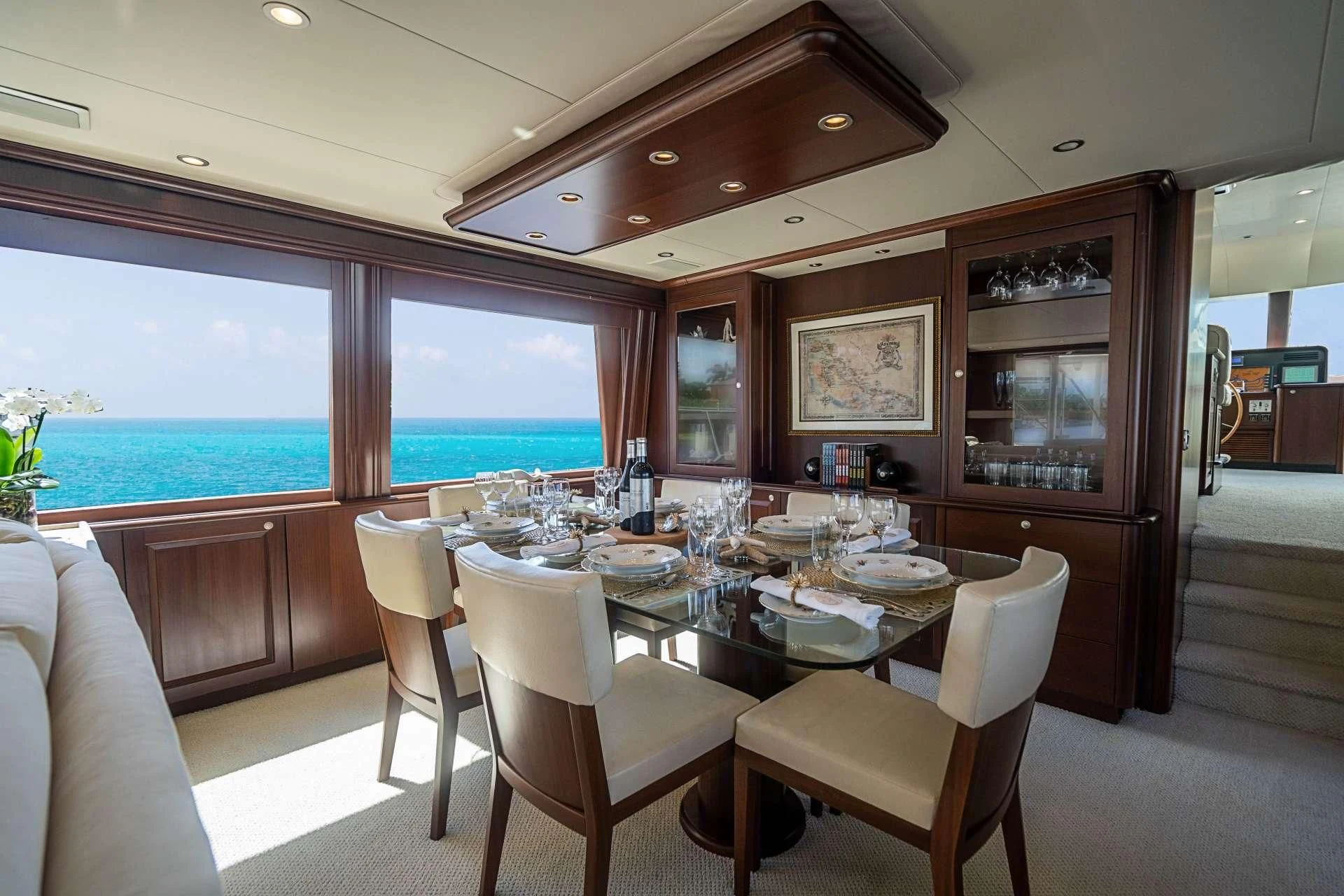 a dining table in a room aboard BOOGIE BABE IV Yacht for Sale