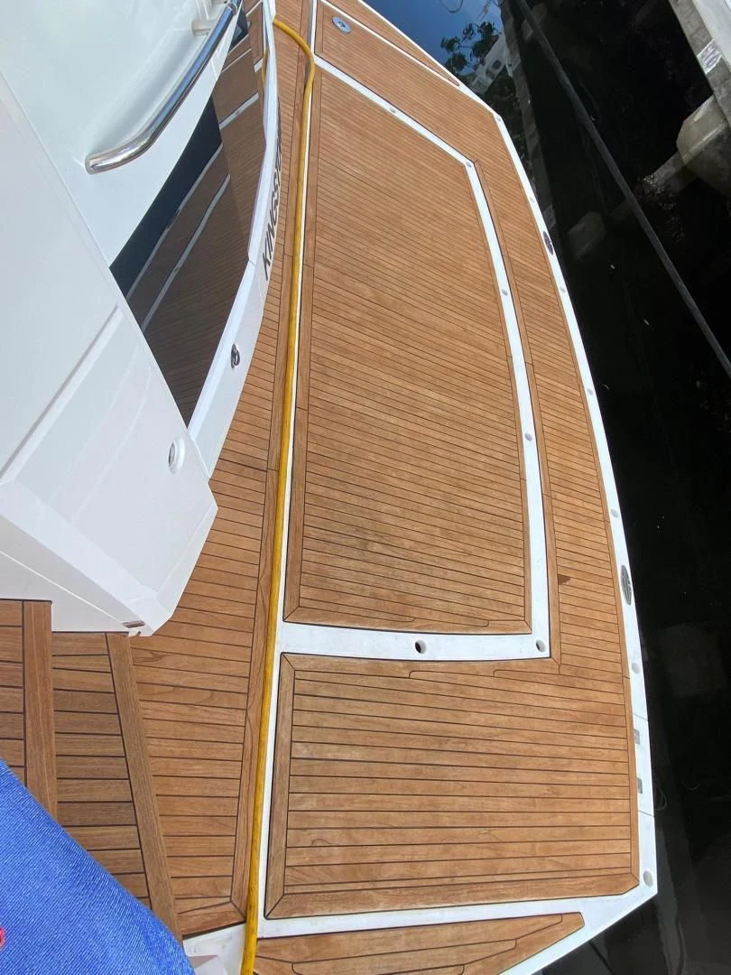 a wooden cabinet with drawers aboard RIII Yacht for Sale