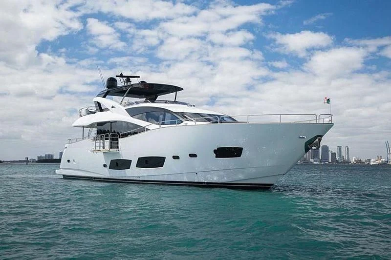 a white yacht in the water aboard RIII Yacht for Sale