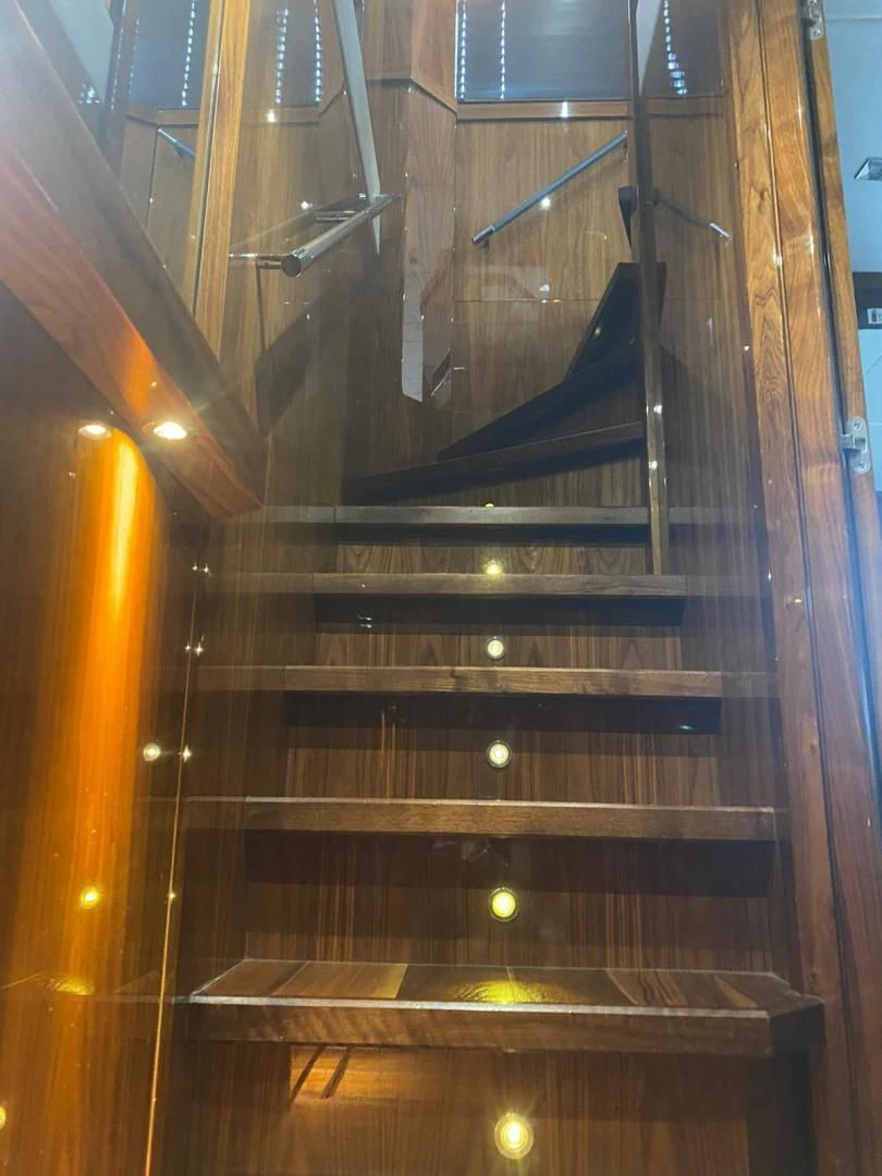 a glass case with a glass door aboard RIII Yacht for Sale
