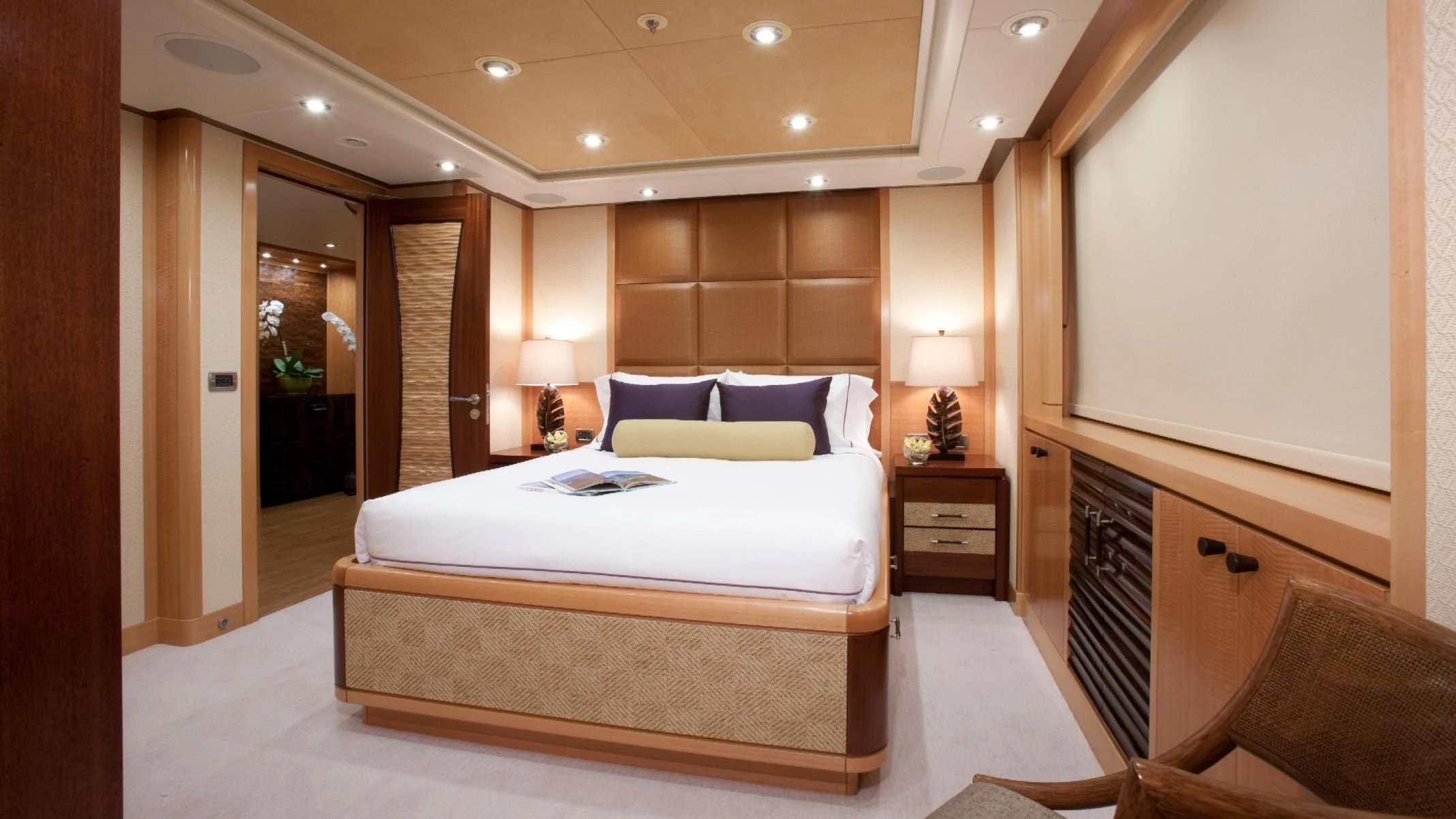 a large bed in a hotel room aboard CHIRON Yacht for Sale