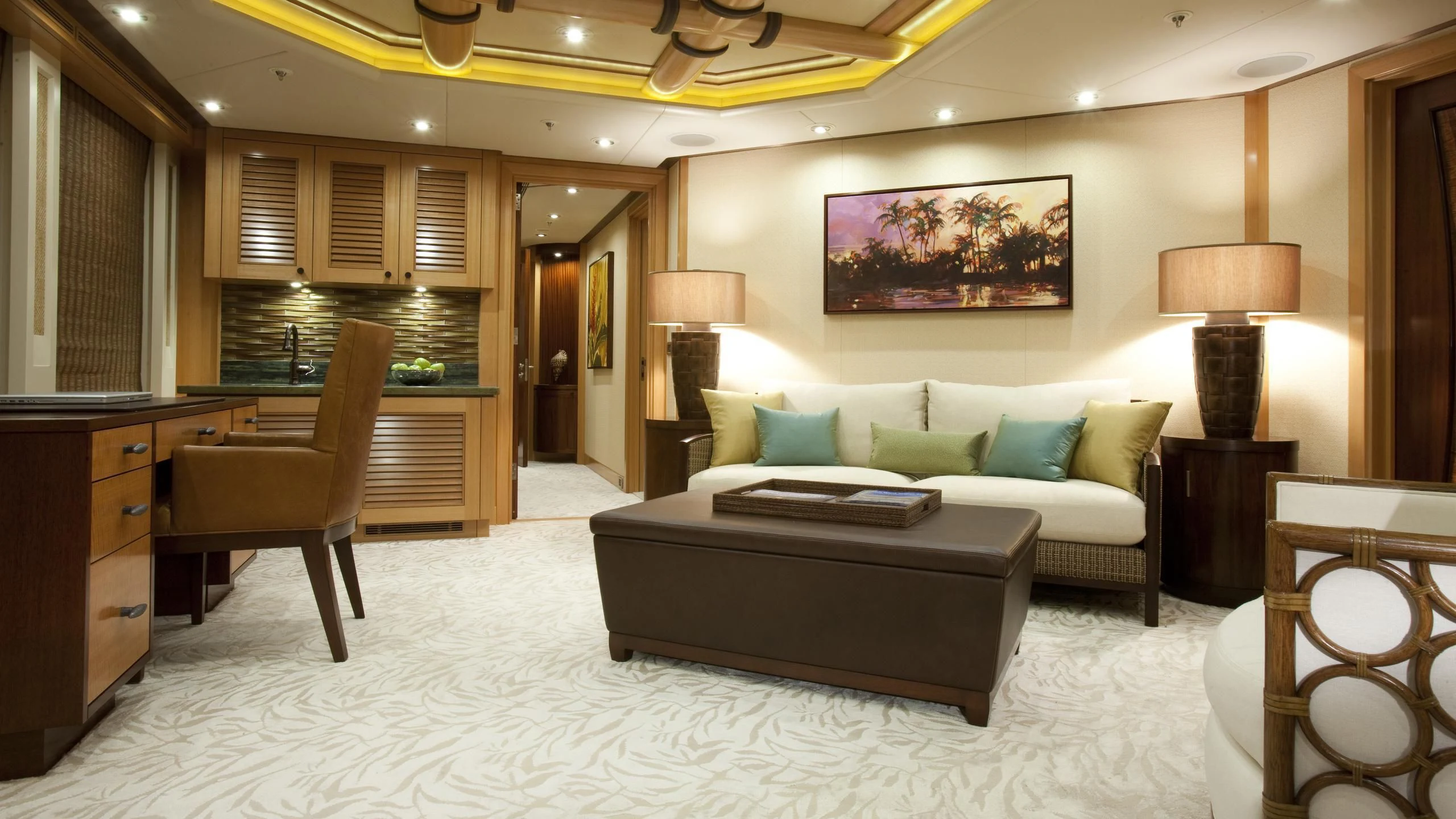 a living room with a couch and a table aboard CHIRON Yacht for Sale