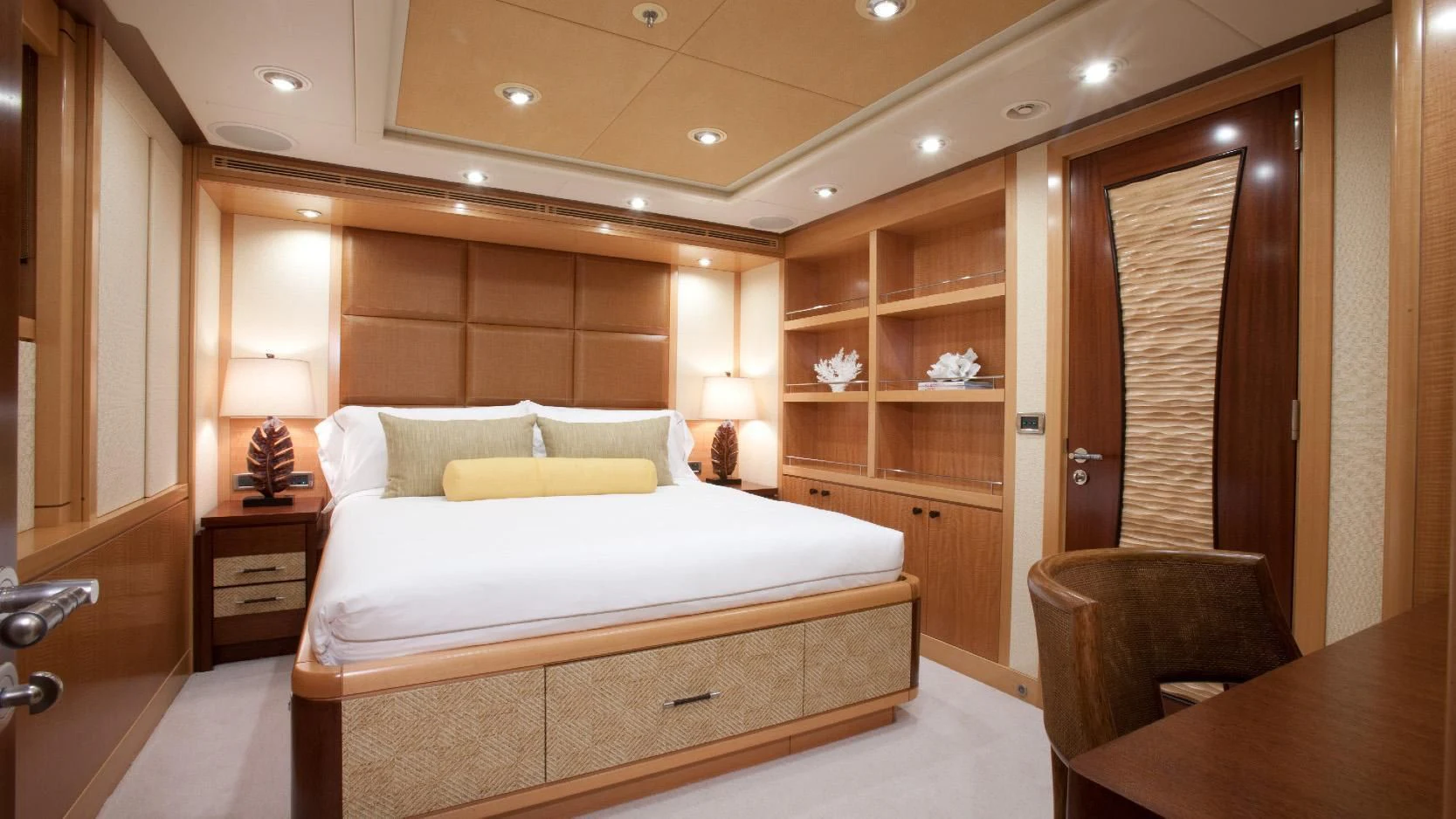 a bed in a room aboard CHIRON Yacht for Sale