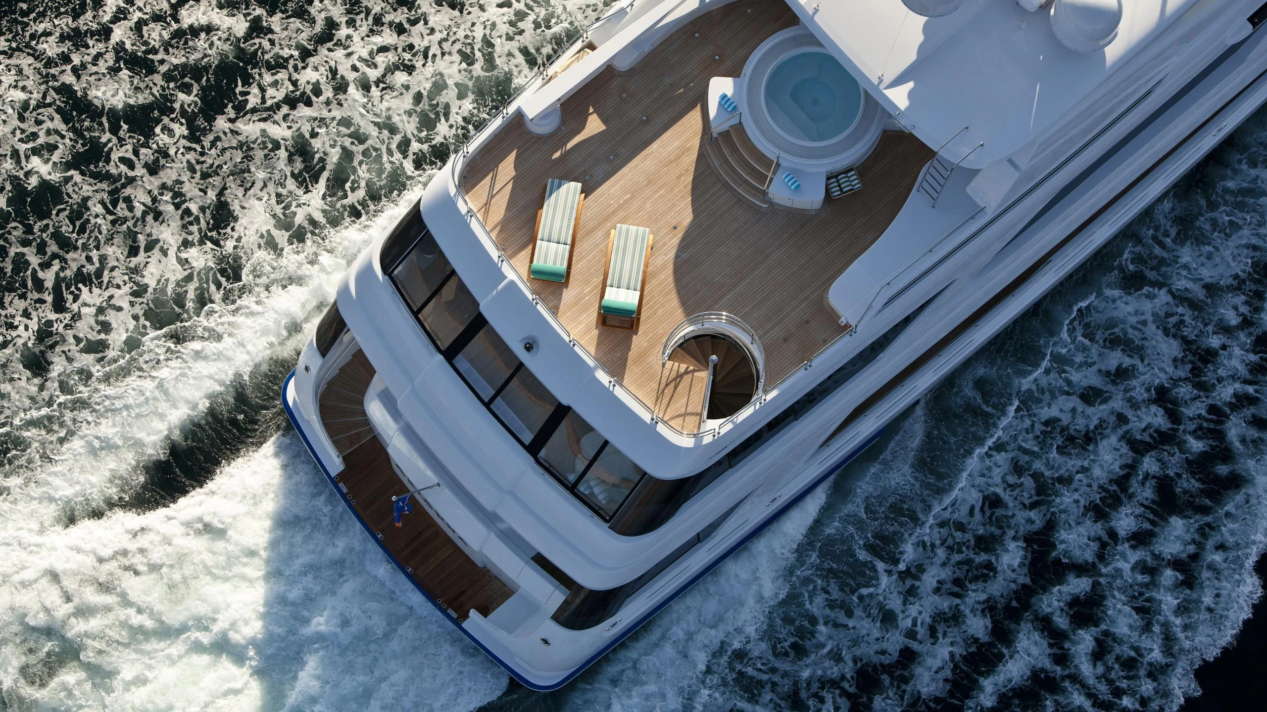 a building with a parking lot aboard CHIRON Yacht for Sale