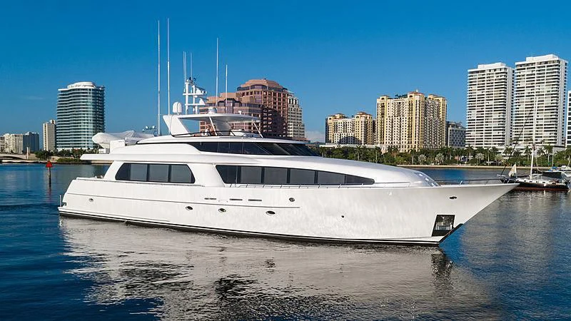 a white yacht in the water aboard THE BEELIEVER Yacht for Sale