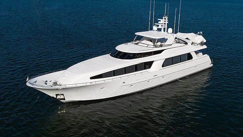 a white yacht on the water aboard THE BEELIEVER Yacht for Sale