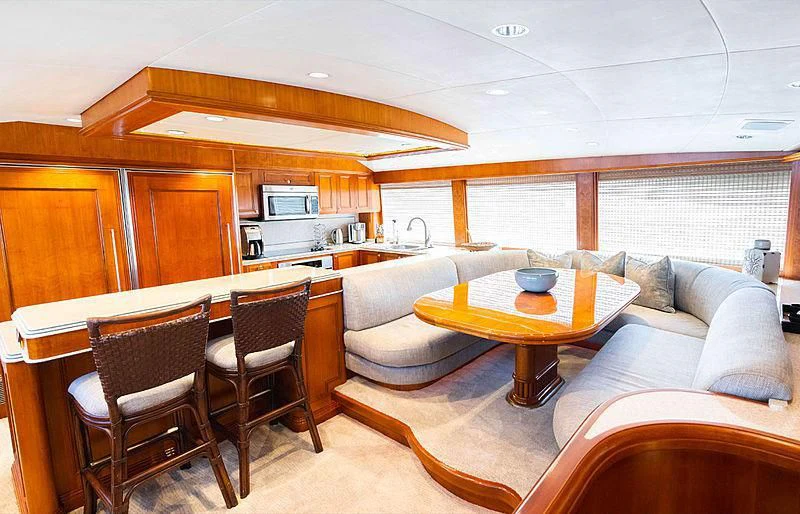 a living room with a couch and a table aboard THE BEELIEVER Yacht for Sale