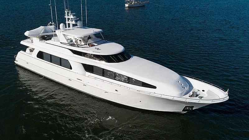 a white yacht in the water aboard THE BEELIEVER Yacht for Sale