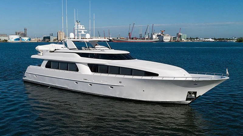 a white yacht in the water aboard THE BEELIEVER Yacht for Sale