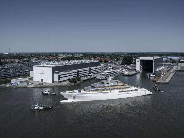 a large building with a boat in the water aboard LEVIATHAN Yacht for Sale
