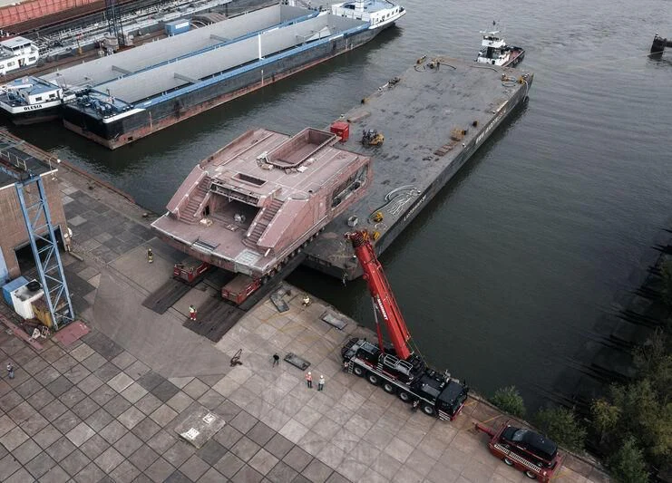 a large ship docked at a port aboard LEVIATHAN Yacht for Sale