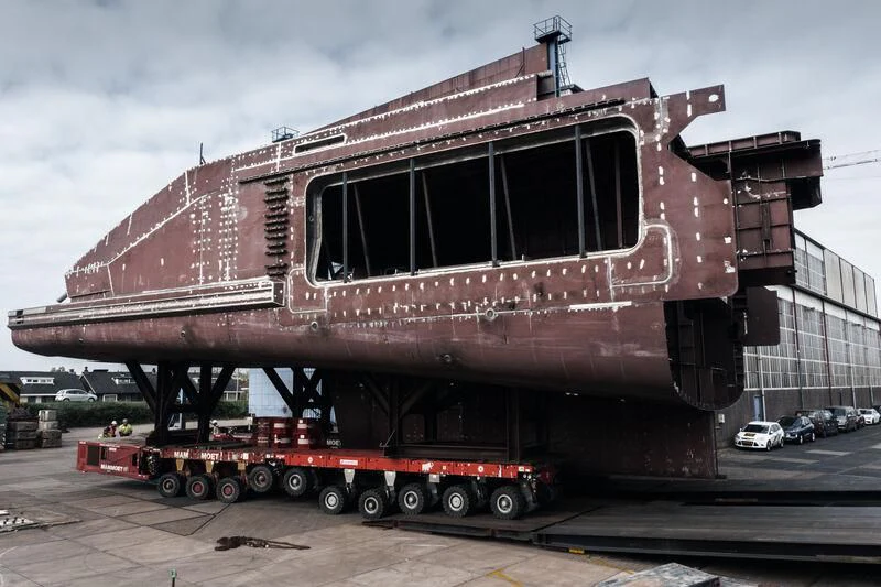 a large truck with a large trailer aboard LEVIATHAN Yacht for Sale