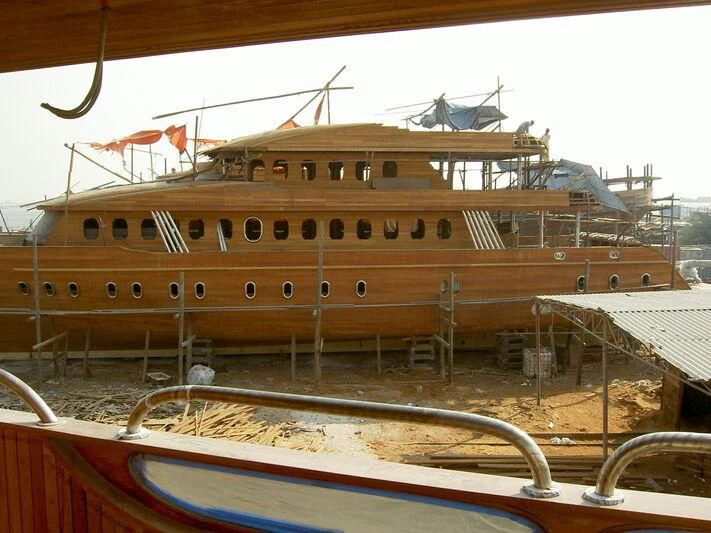 a large ship docked aboard TOUCH WOOD II Yacht for Sale