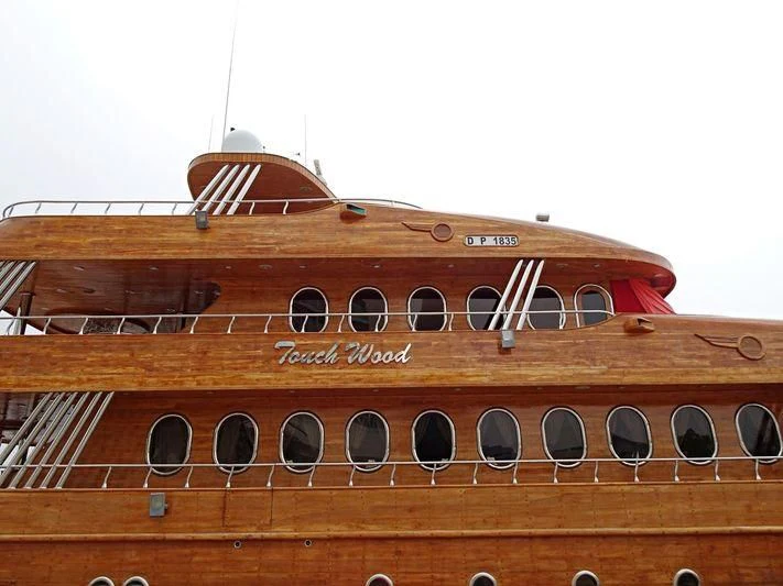 a building with many windows aboard TOUCH WOOD II Yacht for Sale