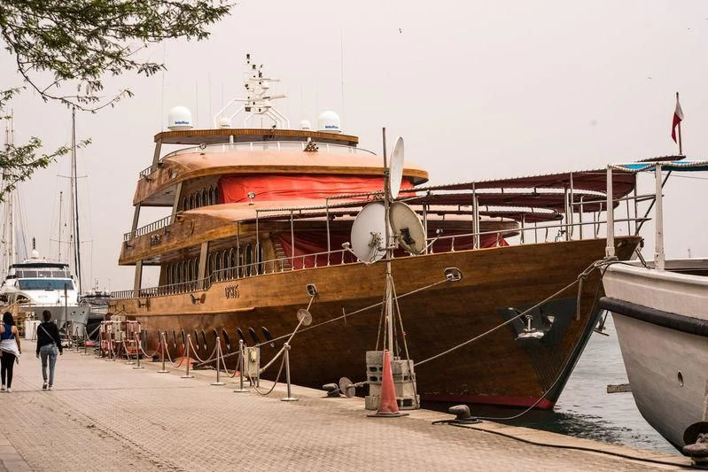 a boat on the dock aboard TOUCH WOOD II Yacht for Sale