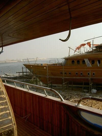 a boat docked at a pier aboard TOUCH WOOD II Yacht for Sale