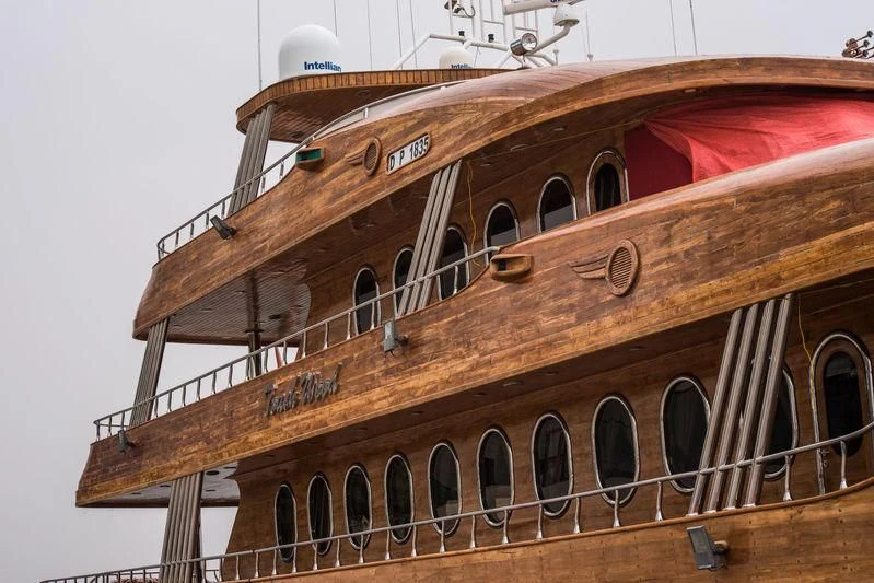 a large wooden boat aboard TOUCH WOOD II Yacht for Sale