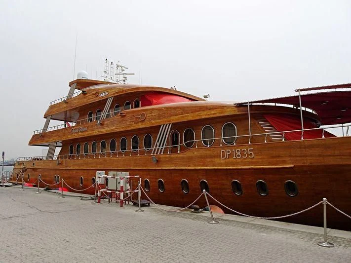 a boat on the sand aboard TOUCH WOOD II Yacht for Sale