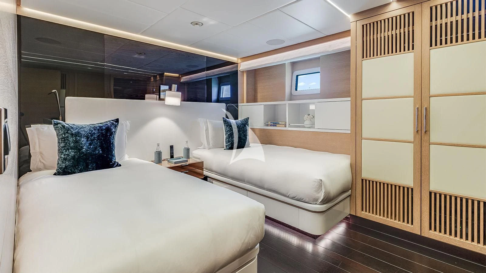 a room with a bed and a closet aboard BON VIVANT Yacht for Sale