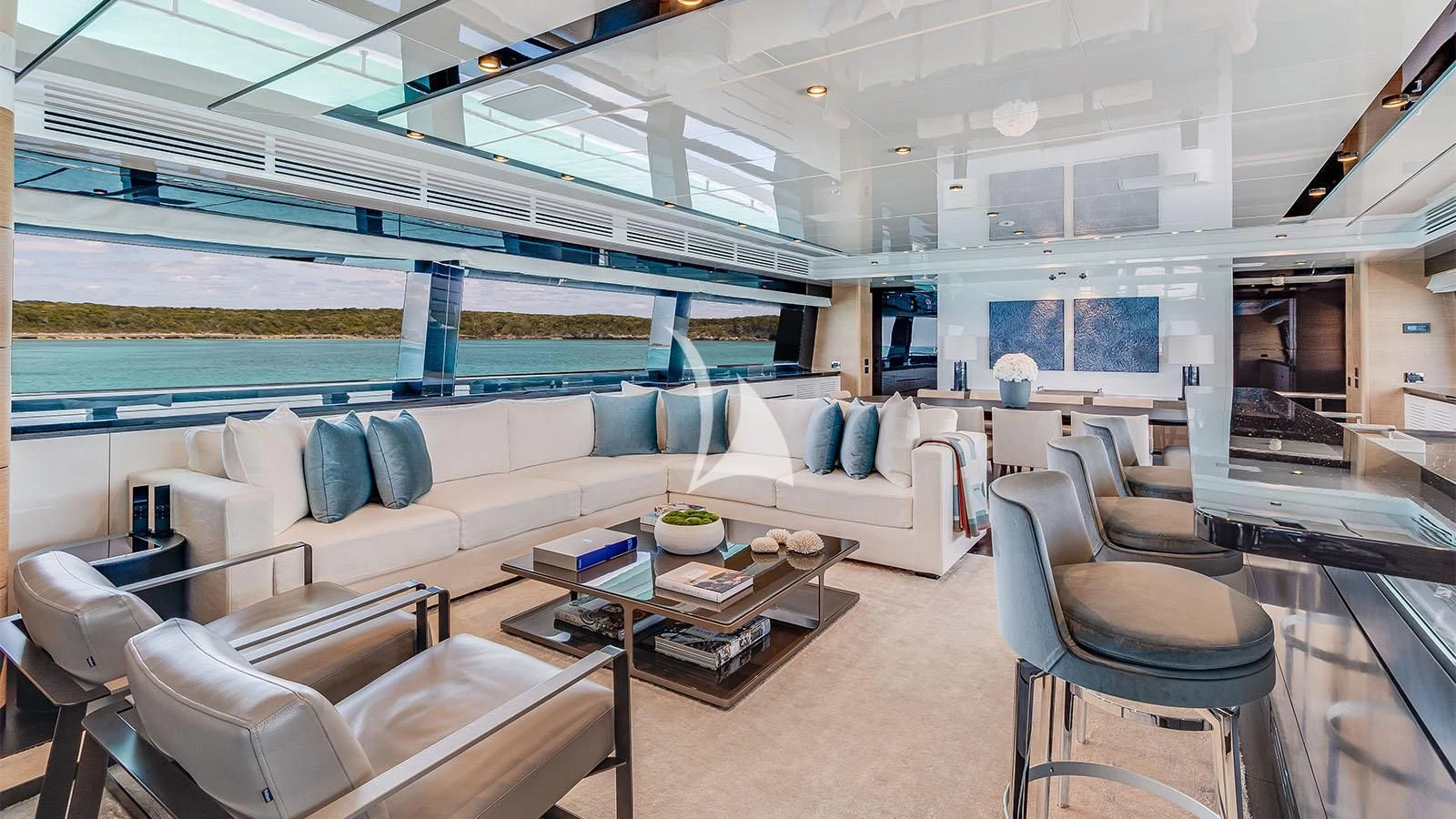 a living room with a large window aboard BON VIVANT Yacht for Sale