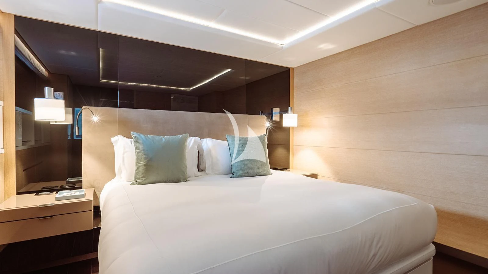 a bed with white sheets aboard BON VIVANT Yacht for Sale