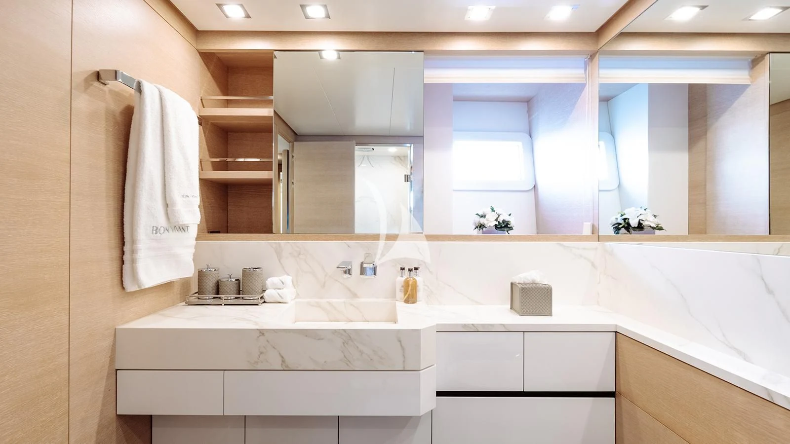 a bathroom with a sink and cabinets aboard BON VIVANT Yacht for Sale