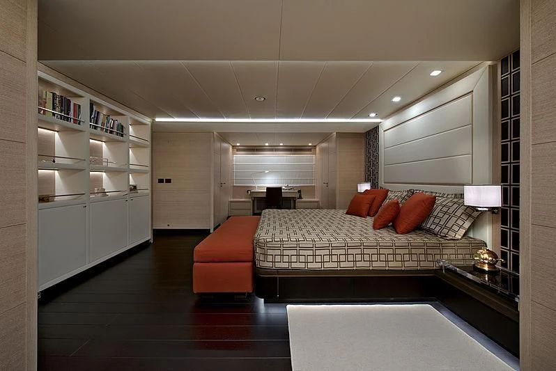 a bedroom with a large bed aboard BON VIVANT Yacht for Sale