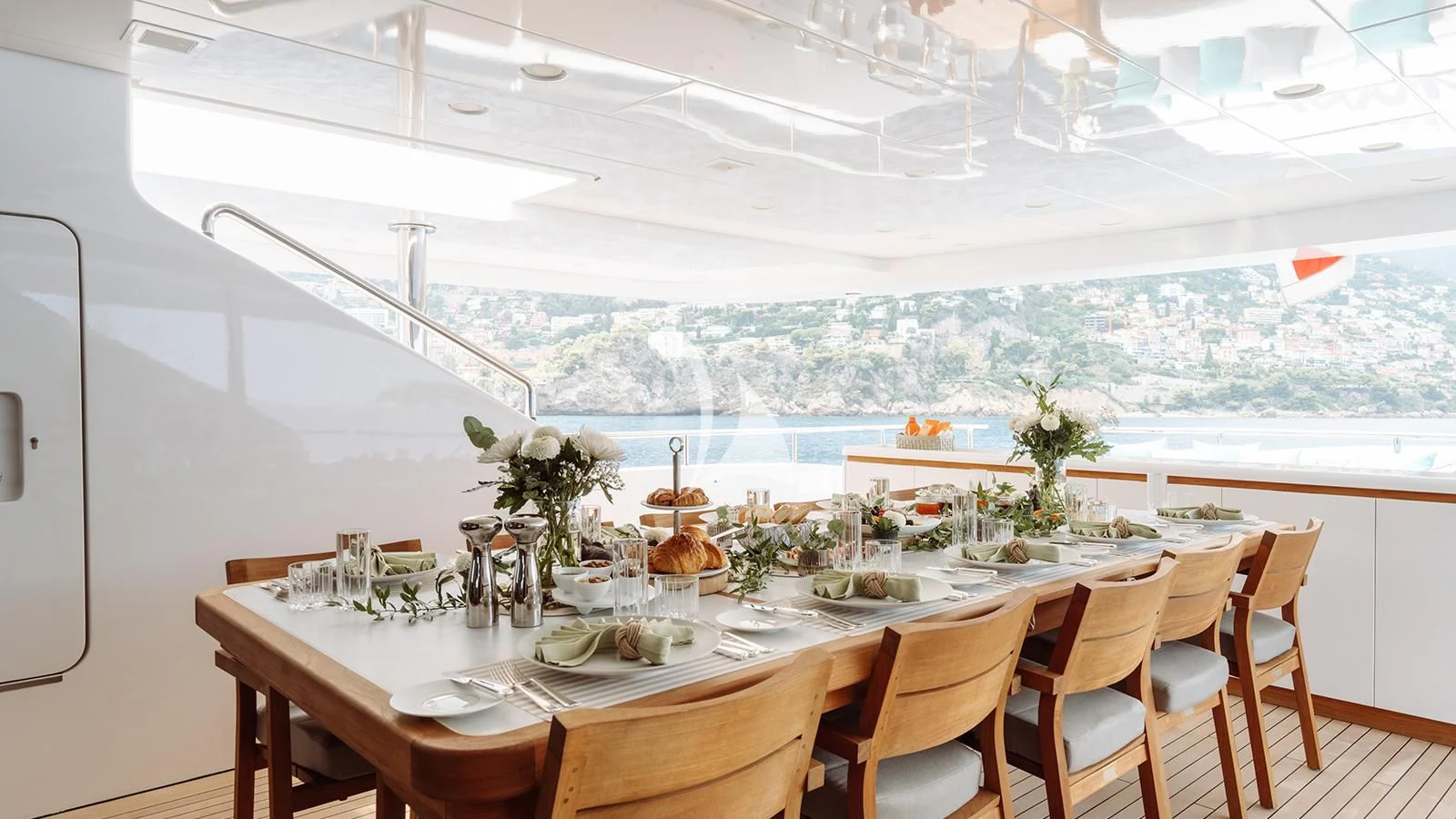 a table set for a meal aboard BON VIVANT Yacht for Sale