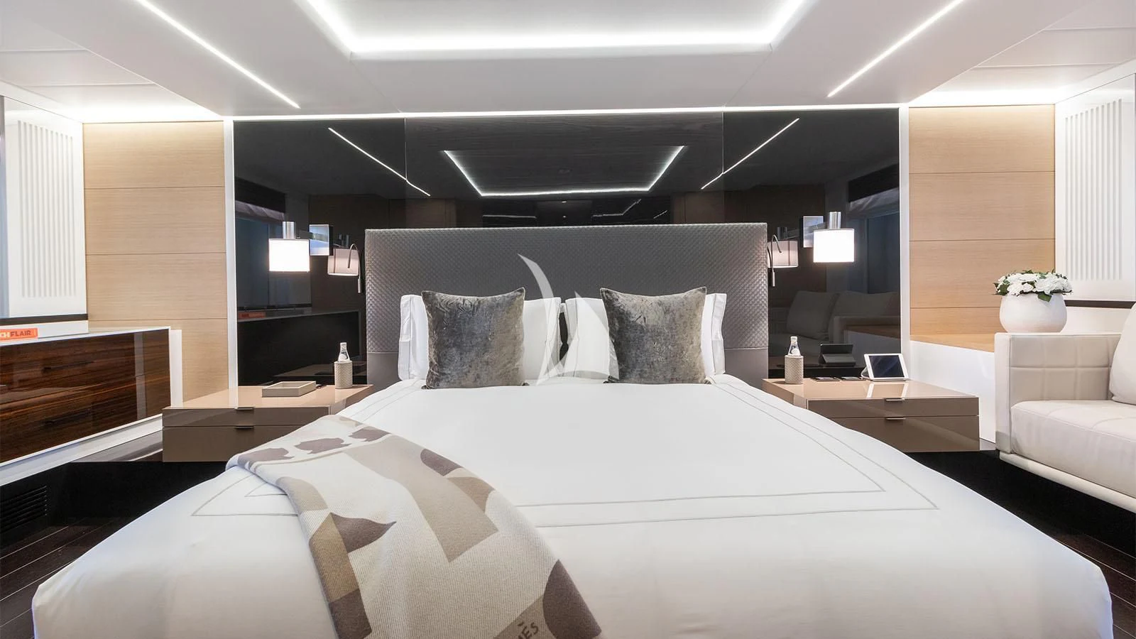 a large bed in a room aboard BON VIVANT Yacht for Sale