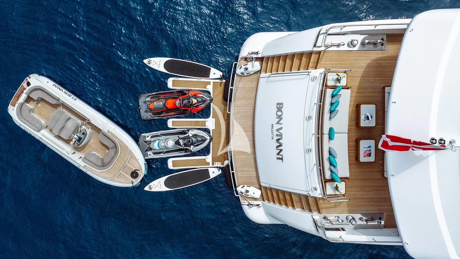 a group of white and gold boats aboard BON VIVANT Yacht for Sale