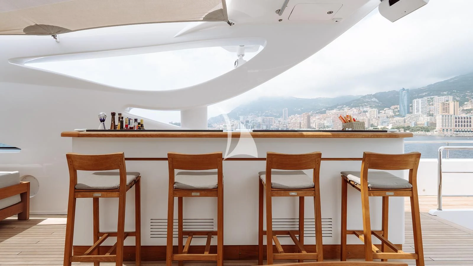 a table with chairs on it aboard BON VIVANT Yacht for Sale