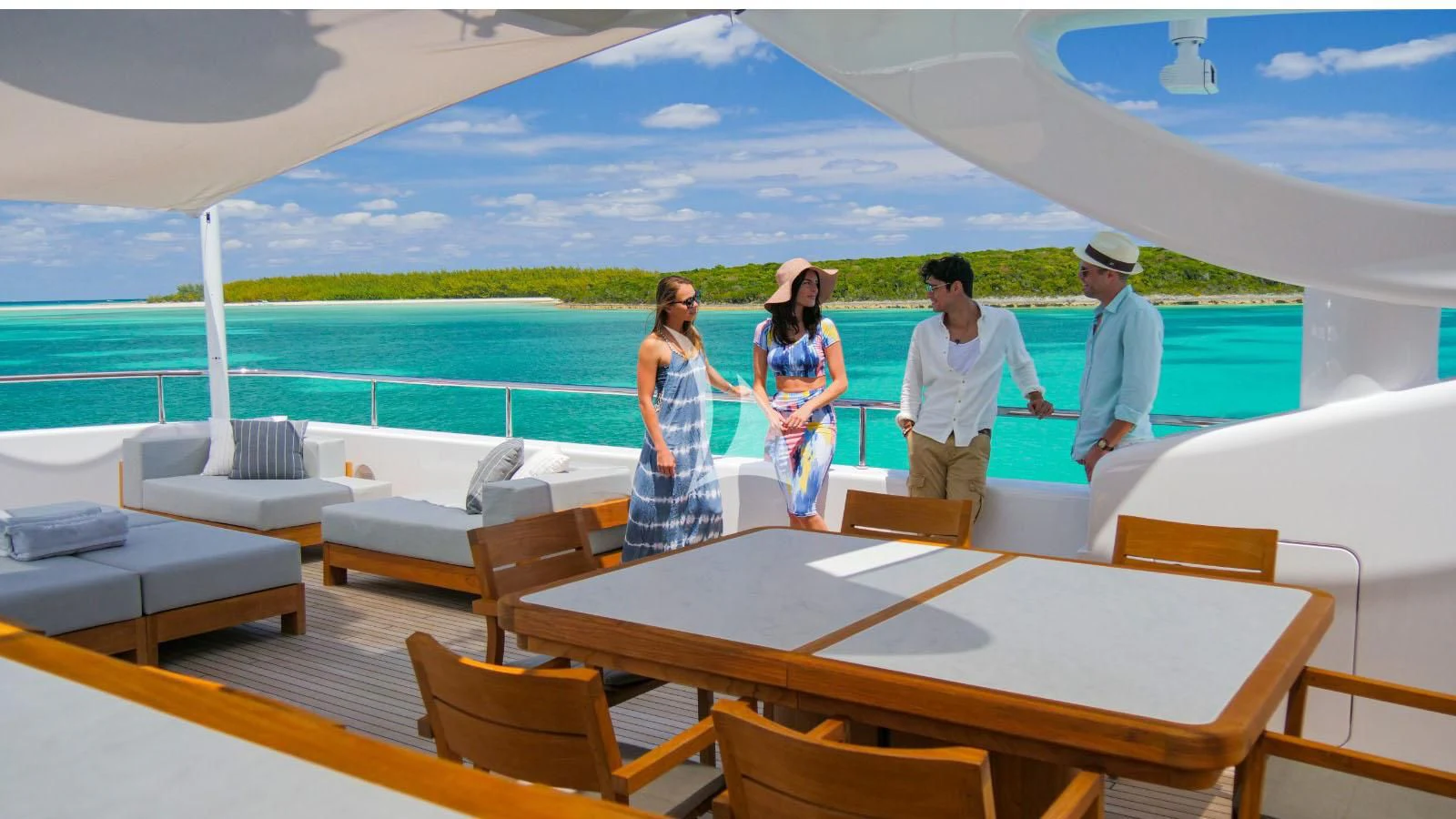 a group of people walking on a boat aboard BON VIVANT Yacht for Sale