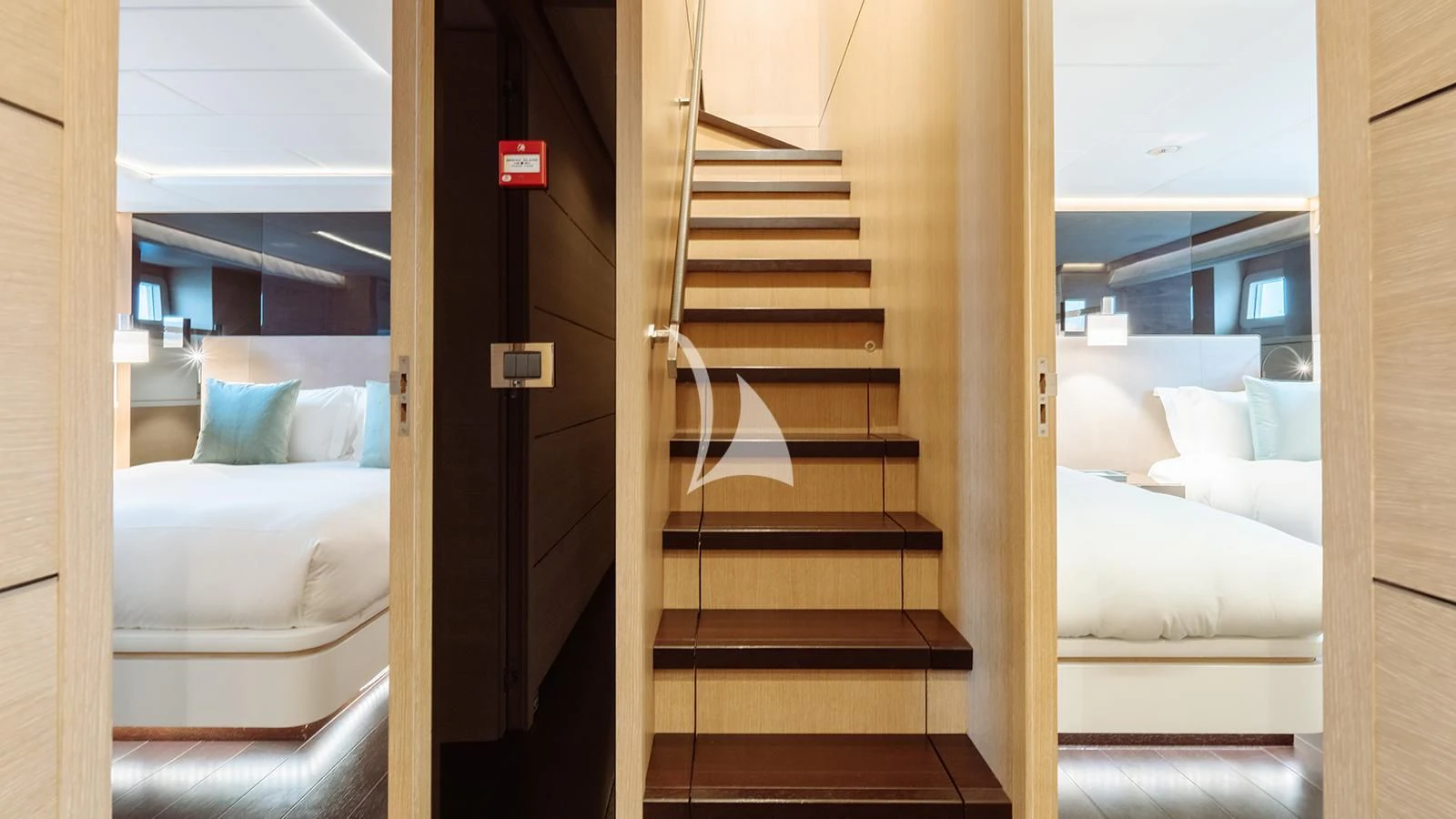 a wooden bunk bed in a room aboard BON VIVANT Yacht for Sale