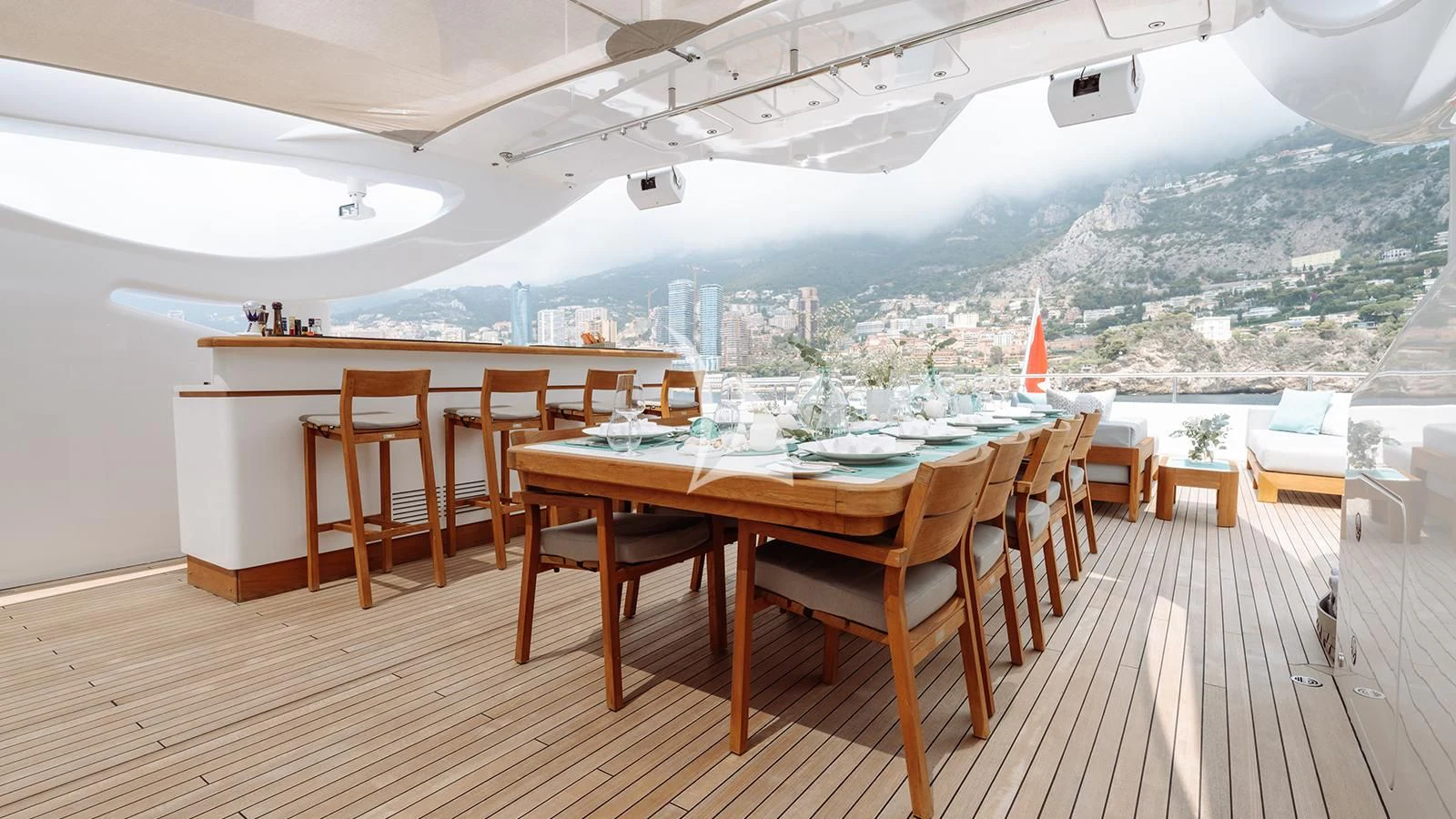 a room with a table and chairs aboard BON VIVANT Yacht for Sale
