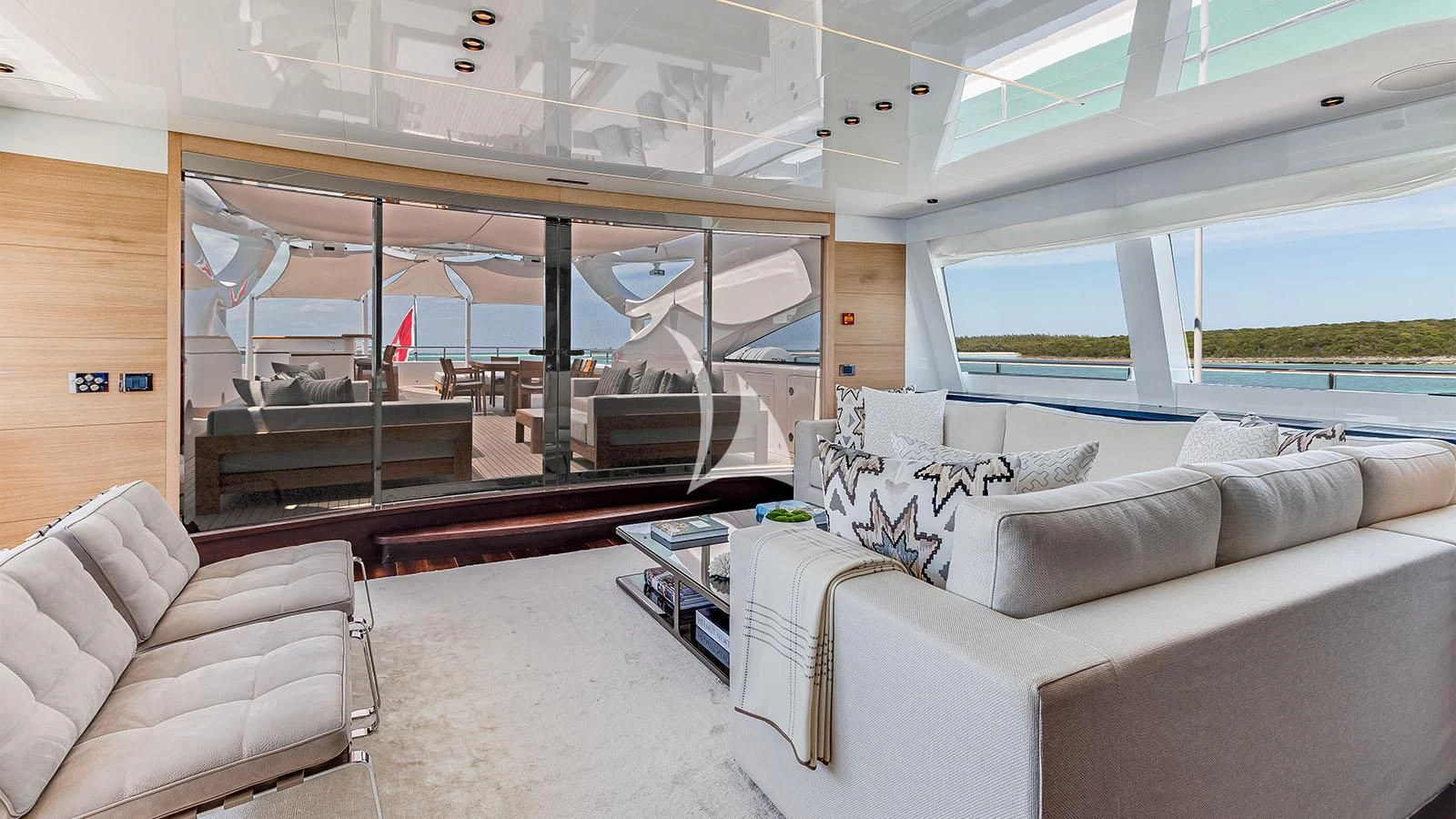 a room with couches and a table aboard BON VIVANT Yacht for Sale