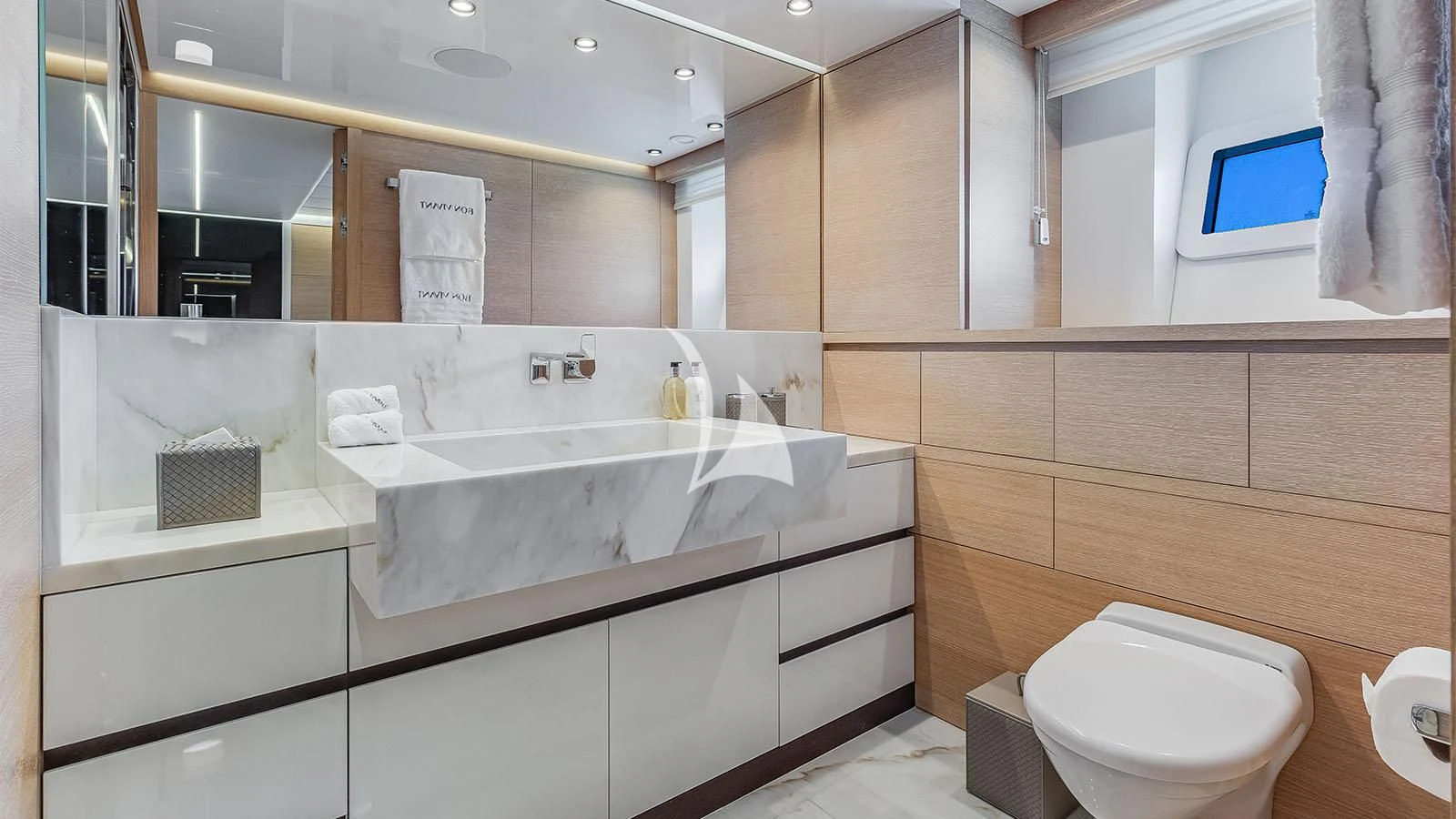a bathroom with a sink and a toilet aboard BON VIVANT Yacht for Sale