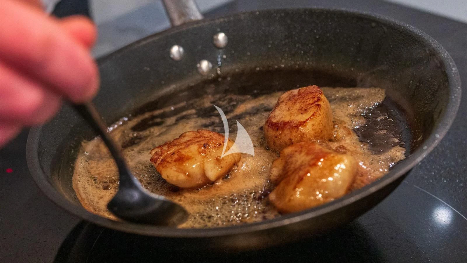 a pan of chicken aboard BON VIVANT Yacht for Sale