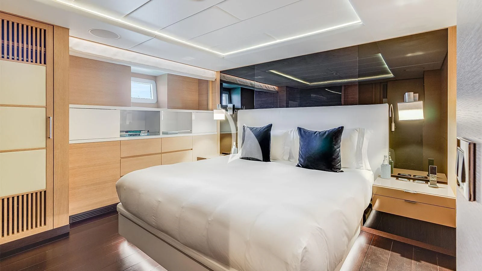 a bed in a room aboard BON VIVANT Yacht for Sale