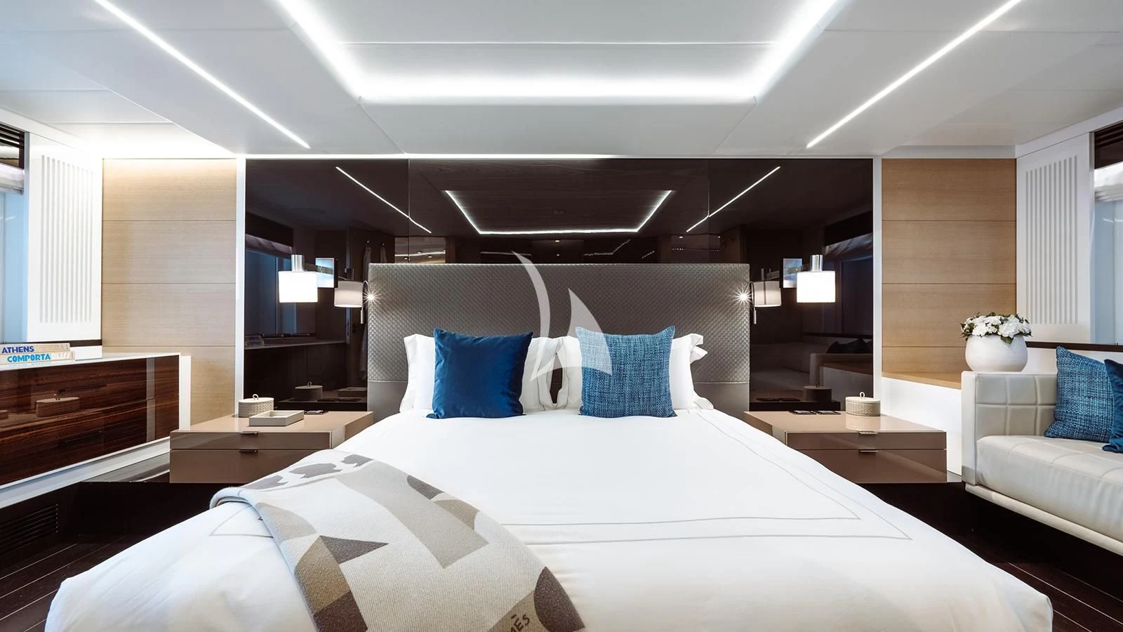 a large bed in a room aboard BON VIVANT Yacht for Sale