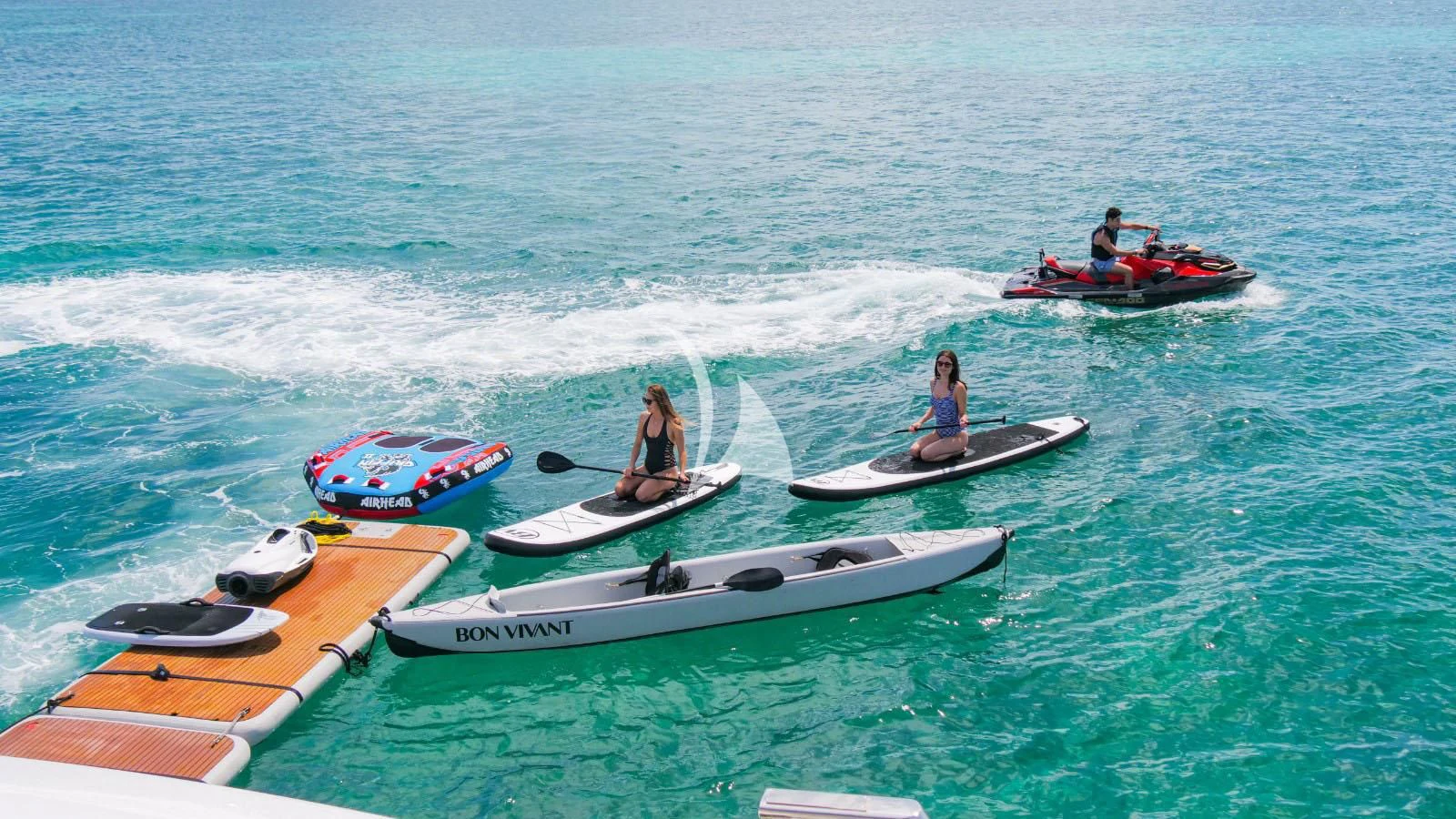 people on boats in the water aboard BON VIVANT Yacht for Sale