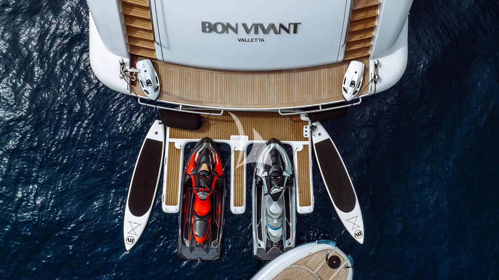 a car with a door open aboard BON VIVANT Yacht for Sale