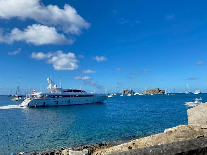 a boat on the water aboard BON VIVANT Yacht for Sale
