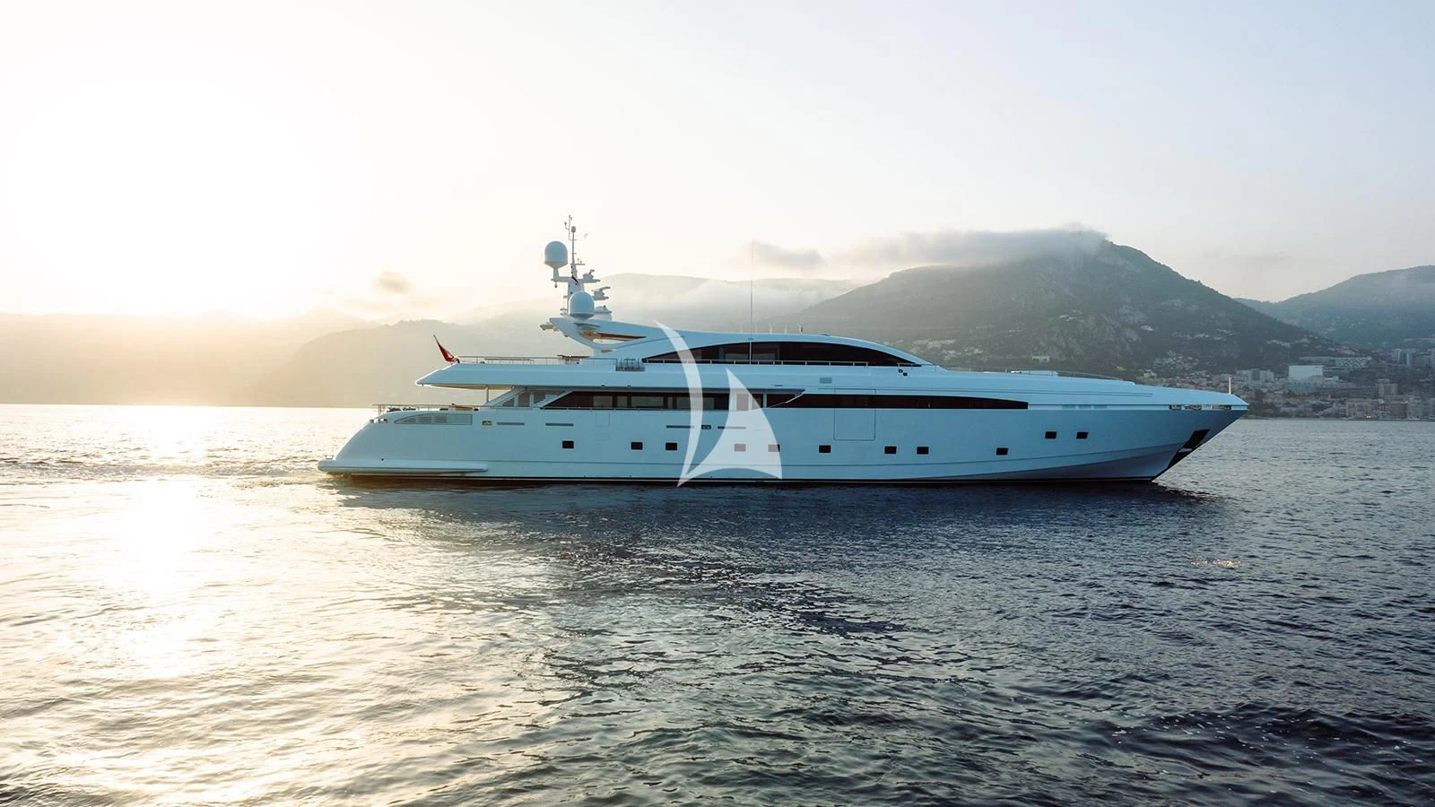 a white yacht on the water aboard BON VIVANT Yacht for Sale