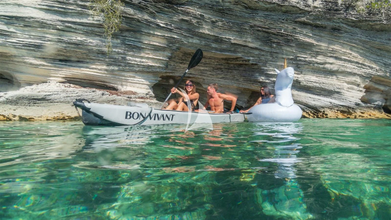 a group of people in a boat aboard BON VIVANT Yacht for Sale