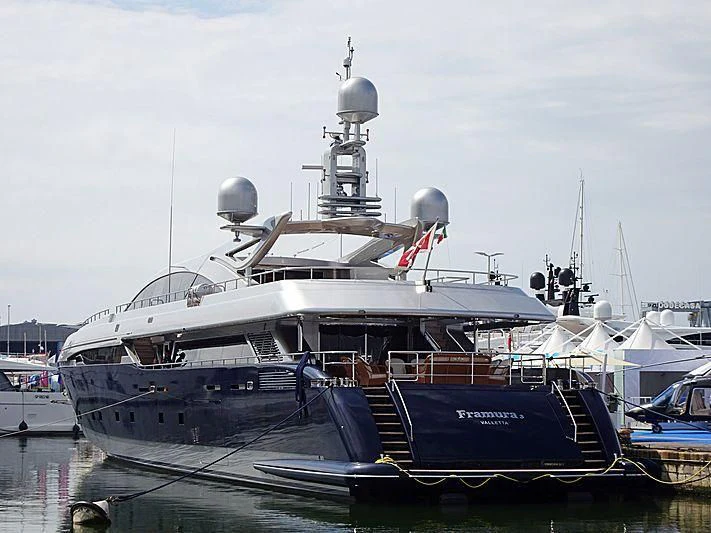 a large white boat with a tower on top aboard BON VIVANT Yacht for Sale