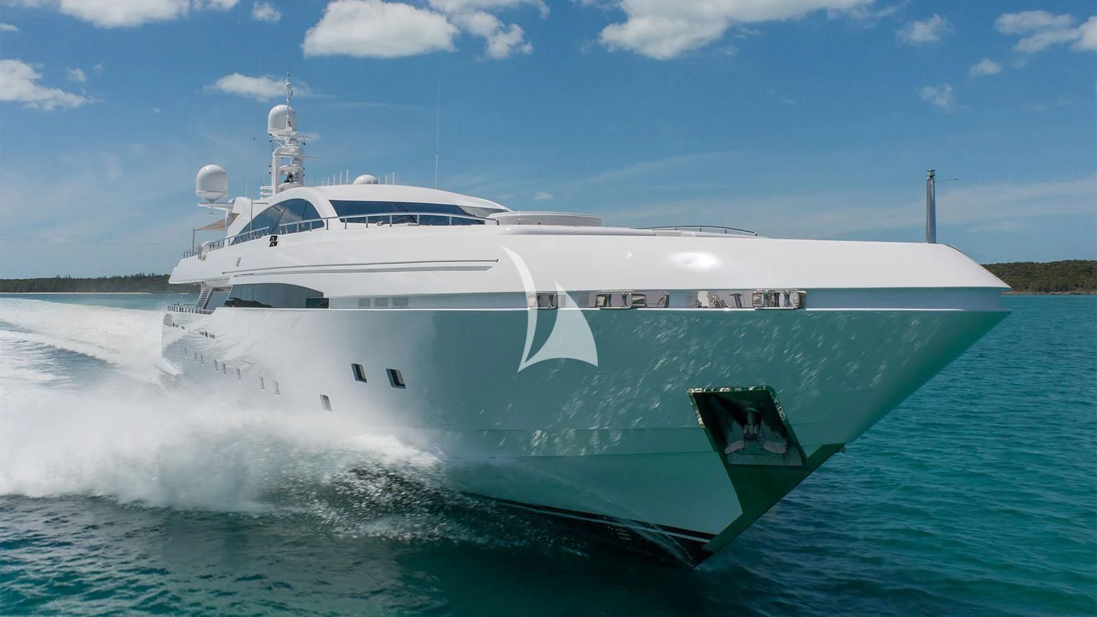 a white yacht on the water aboard BON VIVANT Yacht for Sale