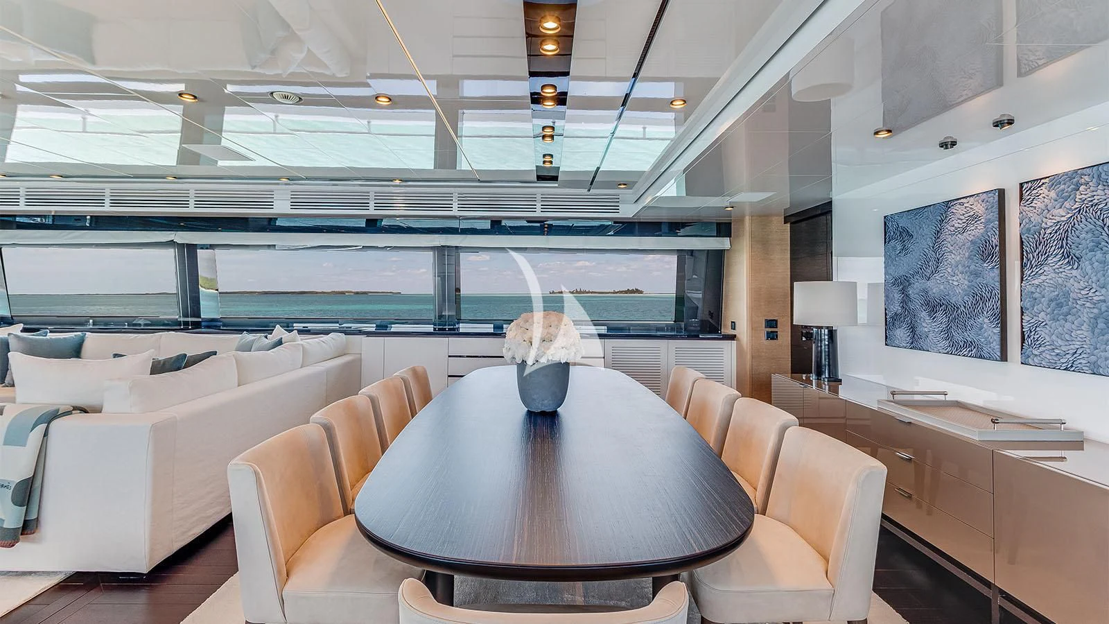 a room with a table and chairs aboard BON VIVANT Yacht for Sale